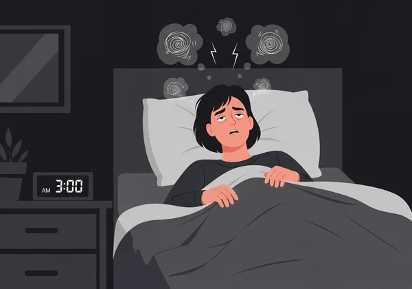 Person awake in bed, struggling with insomnia and fatigue